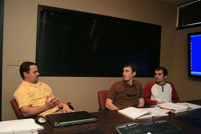 UGA students Cristian Niculas and Seth Peavy with Jackson EMC Engineer Chris Garrish Source: Jackson EMC Website