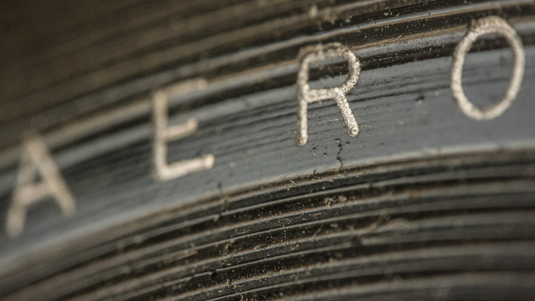 Panasonic 20mm f1.7 with reverse mount adapter. 