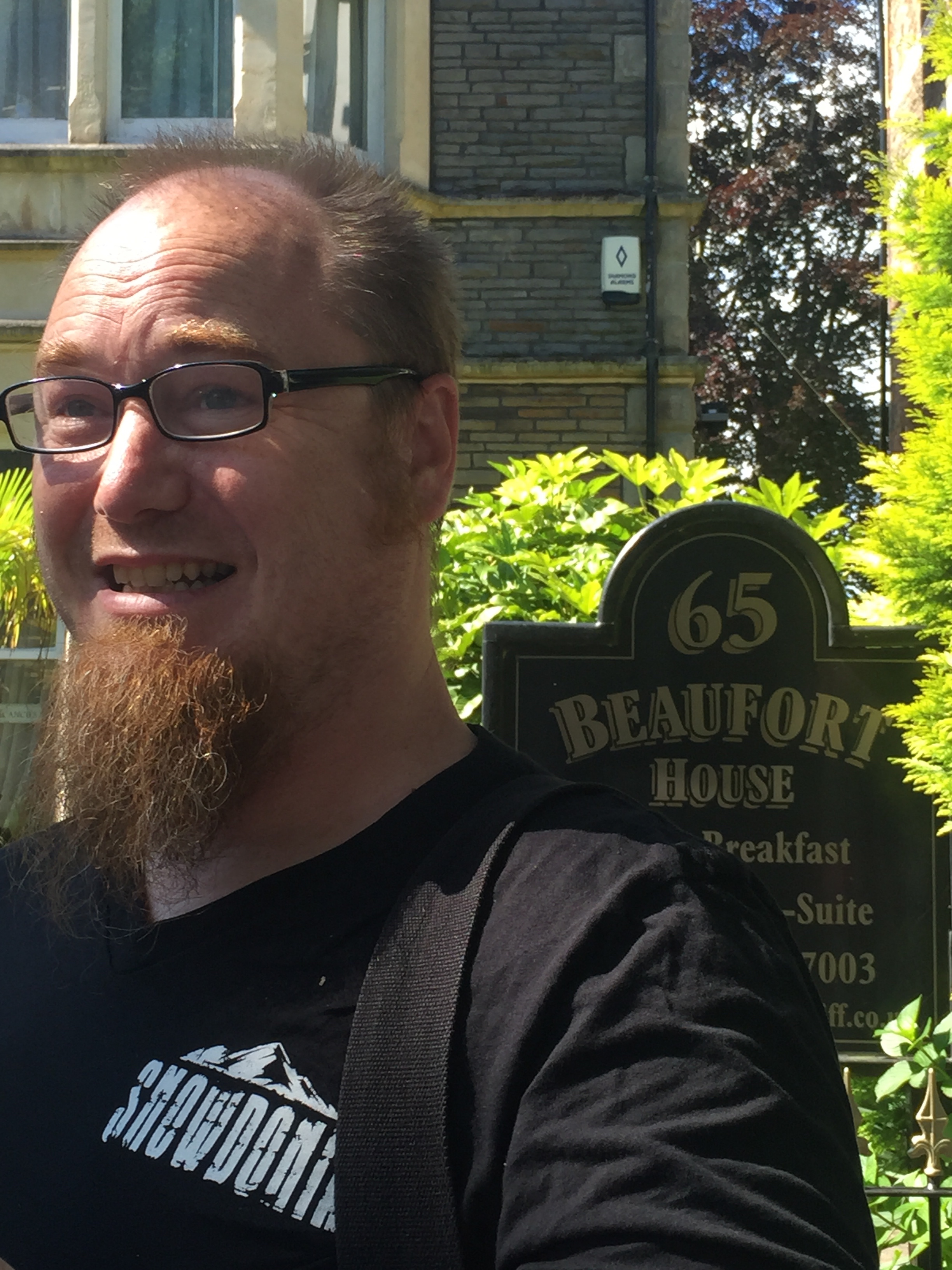 Tom making pretty faces outside the Beaufort House