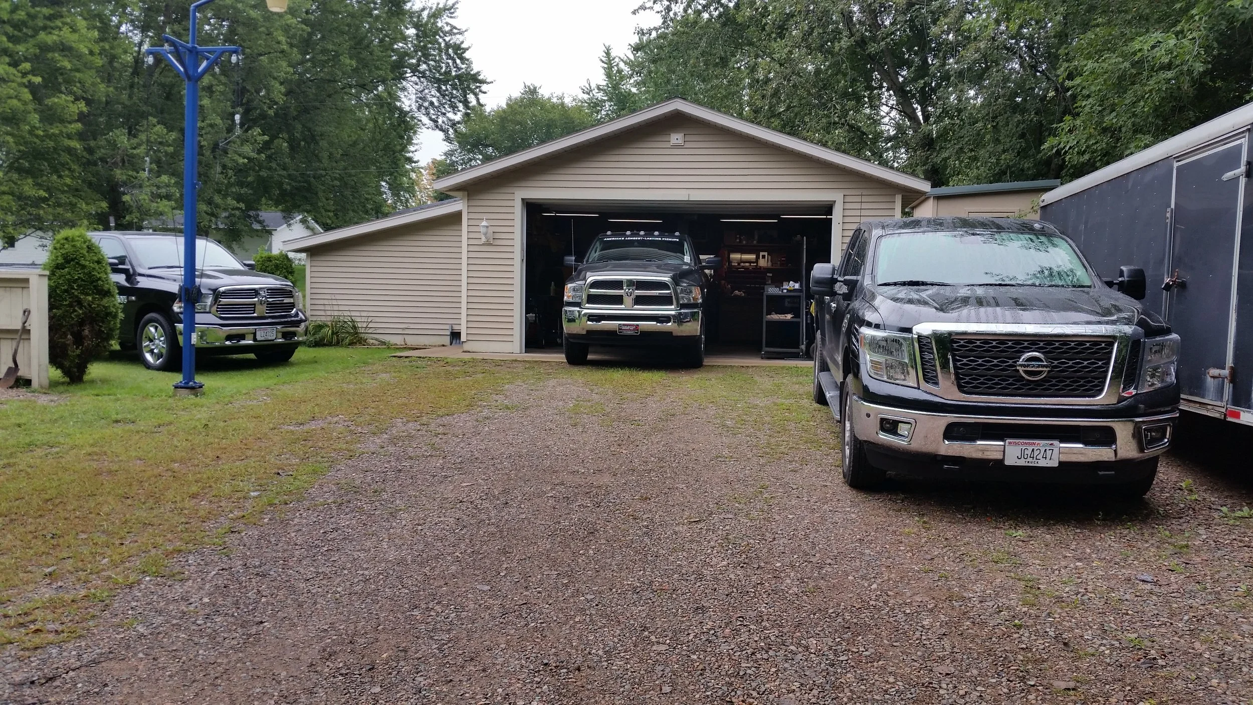 HARD TO FIT LONG TRUCKS. ONLY HAD A CREEPER WITH JACKS AND HEAT IN THE WINTER.