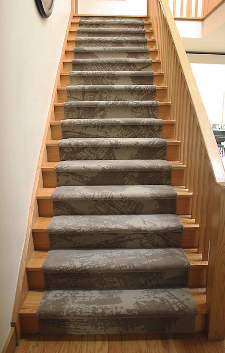 Custom Residential Staircase Carpet. Hand-tufted wool, cut & loop pile construction. Carpet Copyright Creative Matters Incorporated. Interior designed by Levitt Goodman Architects Ltd.