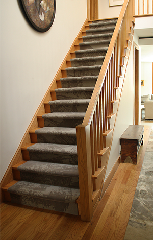 Custom Residential Staircase Carpet. Hand-tufted wool, cut & loop pile construction. Carpet Copyright Creative Matters Incorporated. Interior designed by Levitt Goodman Architects Ltd.