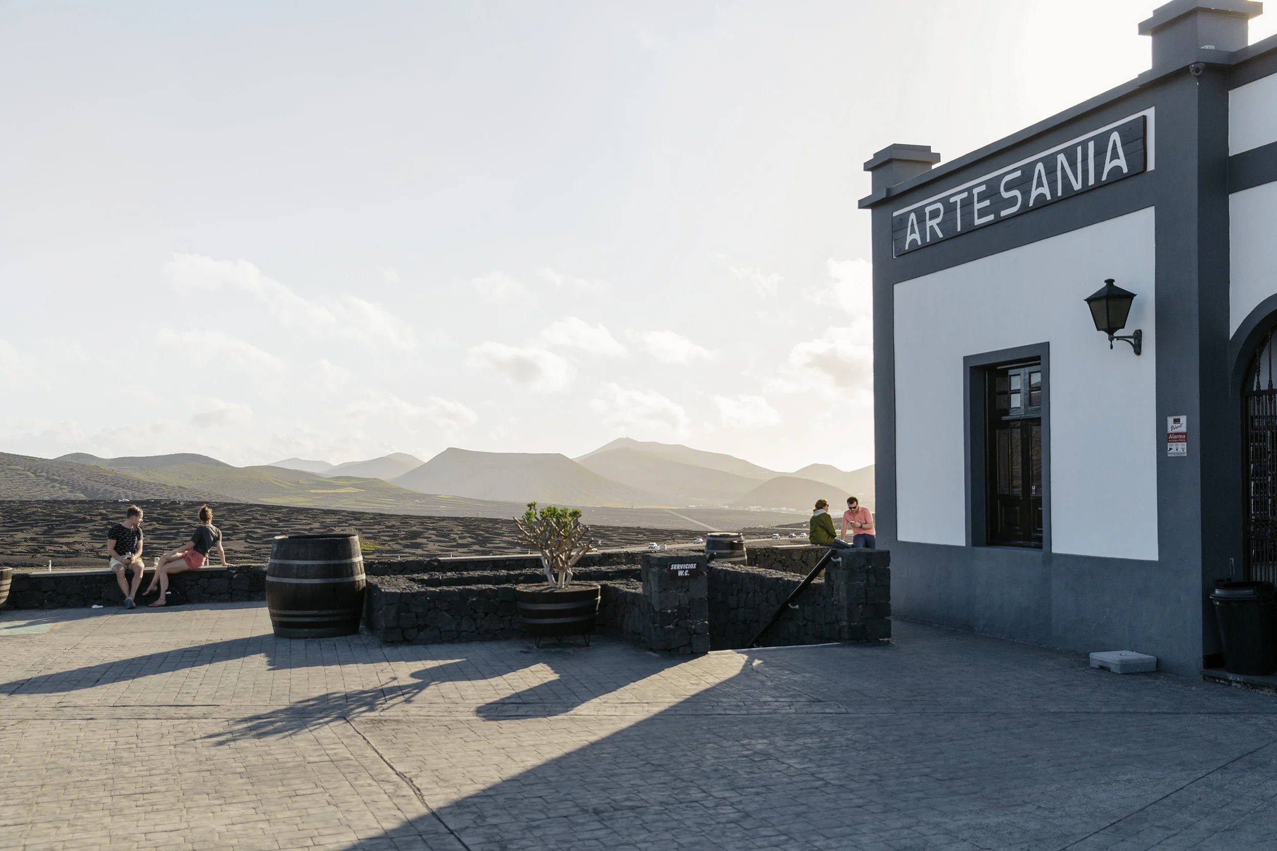People enjoy La Geria winery in Lanzarote, Canary Islands, by Rebecca Stumpf RebeccaStumpf.Food.Travel.Lifestyle.Denver.Boulder.Colorado.Photographer
