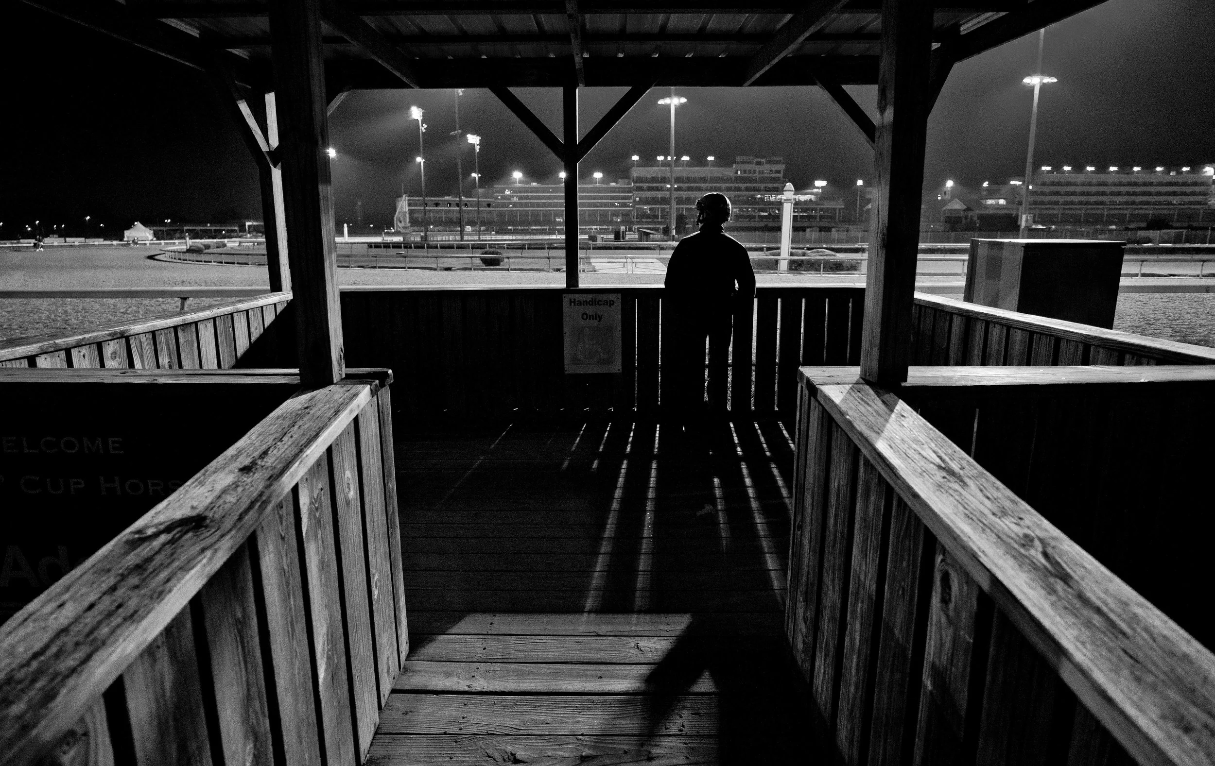 By ED GOLDEN At 83, when many men his age are riding wheelchairs in assisted living facilities, Darrell Wayne Lukas is riding shotgun on a pony at Thoroughbred ports of call from coast to coast, sending his stalwarts through drills to compete at the game’s highest level. One of three children born to Czechoslovakian immigrants, Lukas began training quarter horses full time in 1967 at Park Jefferson in South Dakota. He came to California in 1972 and switched to Thoroughbred racing in 1978. Rather than train at ground level as most horsemen do, Lukas has called the shots on horseback lo these many years, winning the most prestigious races around the globe. A native of Antigo, Wisconsin, he was an assistant basketball coach at the University of Wisconsin for two years and coached nine years at the high school level, earning a master’s degree in education at his alma mater before going from the hardwood to horses. His innovations have become racing institutions, as his Thoroughbred charges have won nearly 4,800 races and earned some $280 million. They are second nature to him now. “I’m on a horse every day for four to five hours,” said Lukas, who’s usually first in line. “I open the gate for the track crew every morning. I ride a good horse, and I make everybody who works for me ride one. “My wife (Laurie) rides out most days. She’s got a good saddle horse. I make sure my number one assistant, Bas (Sebastian Nichols) rides, too.” The Hall of Fame trainer is unwavering in his stance. “I want to be close to my horses’ training, because I think most of the responses from the exercise rider and the horse are immediate on the pull up after the workout or the exercise,” Lukas said. “I don’t want that response 20 minutes later as they walk leisurely back to the barn. I want it right there. If I’m working a horse five-eighths, and I have some question about its condition, I want to see how hard it’s breathing myself, before it gets back to the barn. “I’ve always been on a pony when my horses train, ever since I started. I’ve never trained from the ground. If my assistants don’t know how to ride, they have to take riding lessons, and they’ve got to learn how to ride. I insist on them being on horseback.” Wesley Ward, a former jockey and the 1984 Eclipse Award winner as the nation’s leading apprentice rider, is a landlubber these days as a trainer, yet has achieved plaudits on the international stage. “I don’t think there’s any advantage at all on horseback,” said Ward, who turns 51 on March 3. “Look at (the late) Charlie Whittingham. “He’s the most accomplished trainer in history, I think, and he wasn’t on a pony . . . Everybody’s different. It’s just a matter of style. I can see more from the grandstand when the horses work. “I like to see the entire view, and on a pony, you’re kind of restricted to ground level, so you can’t really tell how fast or how slow or how good they’re going. “I like to step back and observe the big picture when my horses work. I can check on them up close when they’re at the barn. But all trainers are different. Some like to be close to their horses and see each and every stride. I’ve tried it both ways, and I like it better from an overview.” Two-time Triple Crown-winning trainer Bob Baffert, himself a former rider, employs the innovative Dick Tracy method: two-way radio from the ground to maintain contact with his workers on the track. “I used to train on horseback,” said Baffert, who celebrated his 66th birthday on Jan. 13, “but you can’t really see the whole deal when you’re sitting on the track. From the grandstand, you can see the horses’ legs better and you can pick up more. “On horseback, you can’t tell how fast a horse is really going until it gets right up to you. That’s why I switched. I have at least one assistant with a radio who’s on horseback, and I can contact him if someone on the track has a problem.” Peter Eurton, a successful mainstay in California and starting on his third decade as trainer of a multi-faceted stable, is ambivalent. Now 61, the father of budding on-air superstar Britney (TVG, NBC) began his career as a jockey at 19 and rode for two-and-half years until he had to abort due to weight issues. “There’s a slight advantage being on a pony,” Eurton said, “because you’re hands on, but on the other side of it, you’re limited being at eye level. On the ground, I can go up the grandstand steps for a panoramic view and see horses across the track as well as directly in front of me. “There are advantages and disadvantages both ways. I don’t get on horseback now because I’ve had back spasms too many times from being arched over, so I tend to stay away from experiencing that discomfort. “But other trainers love to get on horseback, and I totally get that.” Val Brinkerhoff (62), who rode at bush tracks in Utah, Montana and other god-forsaken outposts for more than three decades before becoming a full-time trainer, still breezes his own horses when he wants to get a hard line on how they’re doing. “You can probably get a better look at what’s going on if you’re on a pony on the track,” Brinkerhoff allowed. “You’re closer to the horses, but that said, if you’re watching from the stands with binoculars, there can be advantages as well. “But I’d rather be on the horse working it myself. To me, that’s the most advantageous . . . I’ve never ridden a pony onto the track to watch my horses train. When I want to know something, I breeze them myself . . . I think the closer you are to the horses, and the more intertwined you are, the better off you are. “I galloped 18 head today because my gallop boy didn’t show up,” Brinkerhoff said on a recent morning at Santa Anita. “I was getting tired and hoping I didn’t have a heart attack.” Leonard Powell was weaned on training across the pond before gaining recognition in the United States, where the 42-year-old Frenchman achieved a racing rarity by sending out 47-1 shot Soi Phet to win the $100,000 Crystal Water Stakes by a head at Santa Anita on May 20. Claimed for $16,000 in 2013, now at age 10, Soi Phet is believed to be the oldest stakes winner in Santa Anita’s storied history. The California-bred gelding has earned nearly $1 million. “It’s definitely an advantage training on the track,” Powell said, “because there are things you can see on horseback you cannot see from the ground, plus nothing is lost in communication between trainer and rider. “Whenever a trainer can get on his own horses, it’s a lot better. I’ve become too heavy to breeze my horses,” he said with a chuckle, “but I always prefer to be on a pony or on horseback. That enables me to focus more on my workers without distraction. In Europe, I’d say about 50 percent of trainers are on a pony.” Art Sherman, yet another former jockey whose training career reached its apex with two-time Horse of the Year California Chrome, plied his trade aboard equines when he was younger, but approaching his 82nd birthday come Feb. 17, now confines his tutoring on good old terra firma. “I used to have my own ponies,” Sherman said, “but not now; I watch my horses work from ground level these days. It was good being on a pony, but when you get my age, it’s a little tougher to get on a horse. I really don’t see any significant difference in training one way or the other.” Similar to fellow octogenarian, Lukas still holding the reins during training hours is no surprise to Sherman. “Being on a pony is as natural to him as getting up in the morning and putting on his boots,” Sherman said. John Shirreffs, a former Marine who served in Vietnam, then headed to Hawaii to become a surfer after his discharge, is more than comfortable maintaining a low profile, be it on horseback or the ground. But if he had his druthers, he’d prefer training while on a pony. As for being in the public eye, Shirreffs does so with reluctance, bringing to mind a description of Ty Cobb—arguably the greatest baseball player of all-time, but a tyrant on and off the field. Of the irascible Cobb, a peer once said, “He played his whole career with his teeth clenched.” Thankfully, Shirreffs isn’t close to being in that league. When push comes to shove, he is mellow, intelligent and introspective. “It’s always nice to be on your pony because you’re not talking to anybody,” said Shirreffs, 73. “There are no distractions on a pony,” he added with a chuckle. “Everybody trains differently, but I like to ride the pony just because I like to sit on a horse.” Despite setting the gold standard as a Thoroughbred trainer early on in a career spanning more than half a century, Lukas, to the game’s benefit, has no plans to retire and ride off into the sunset. He will follow in the philosophical footsteps of Charlie Whittingham, who, when asked when he would retire, always had the same retort: “Retire? Retire to what?” Lukas adheres to the same mantra. Asked if the day will come when he calls it a career, he responded quickly and unequivocally with this: “I’m going to train right up to the end.”