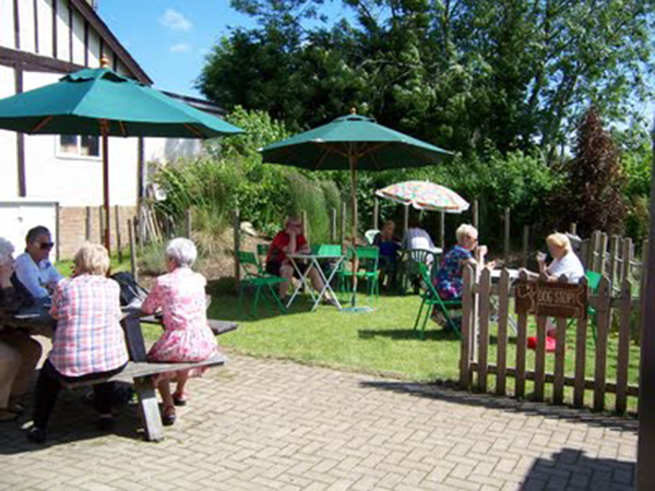  The Shop has a lovely garden to sit and enjoy fresh sandwiches, cake, coffee of tea from the coffee shop 