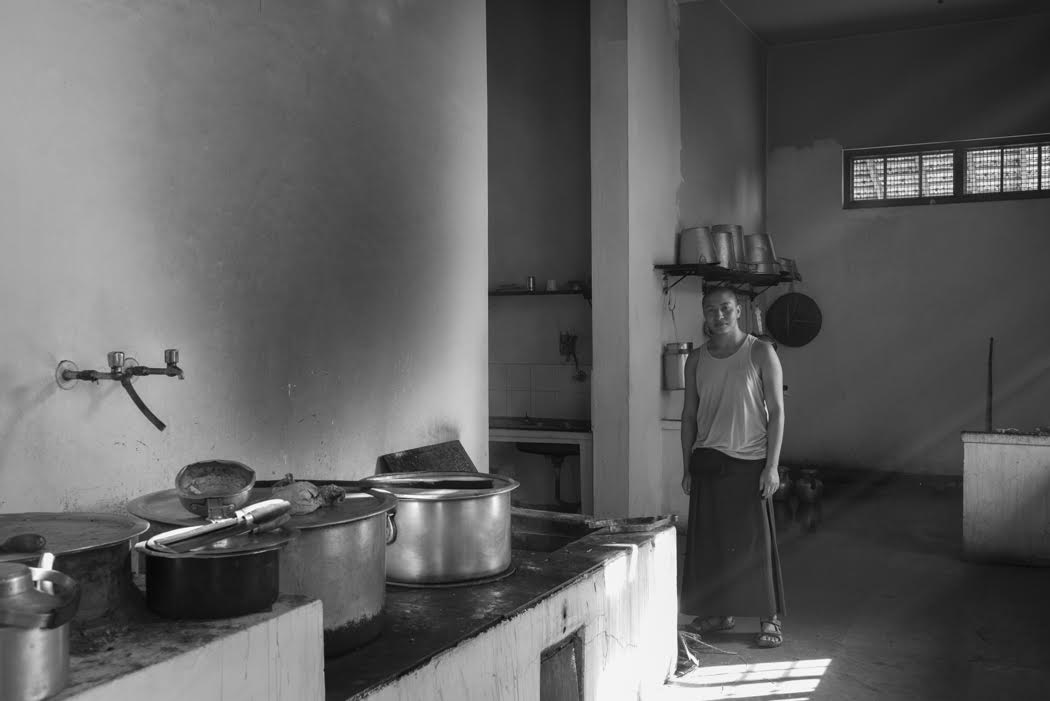 Head of the kitchen, Venerable Lobsang Tenzin with our wood burning stove