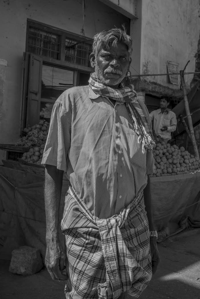 and men wear lungis