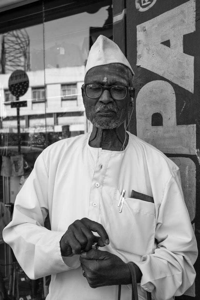 Delighting in his paan