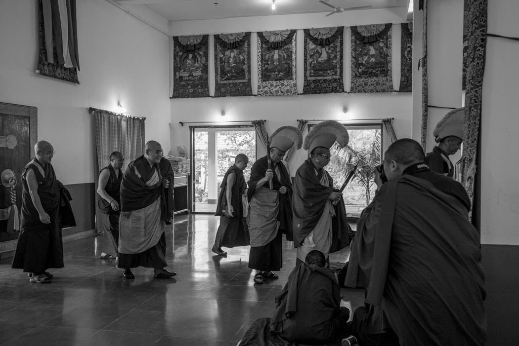 The Disciplinarian, ex-Abbot and I hold incense sticks as we lead Rinpoche into our temple