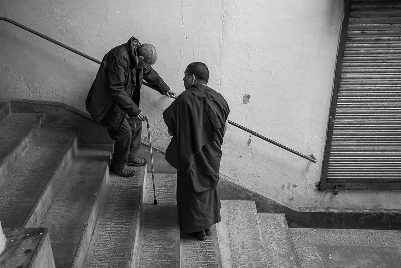 Rinpoche leaves his room below the main temple in Dharamsala