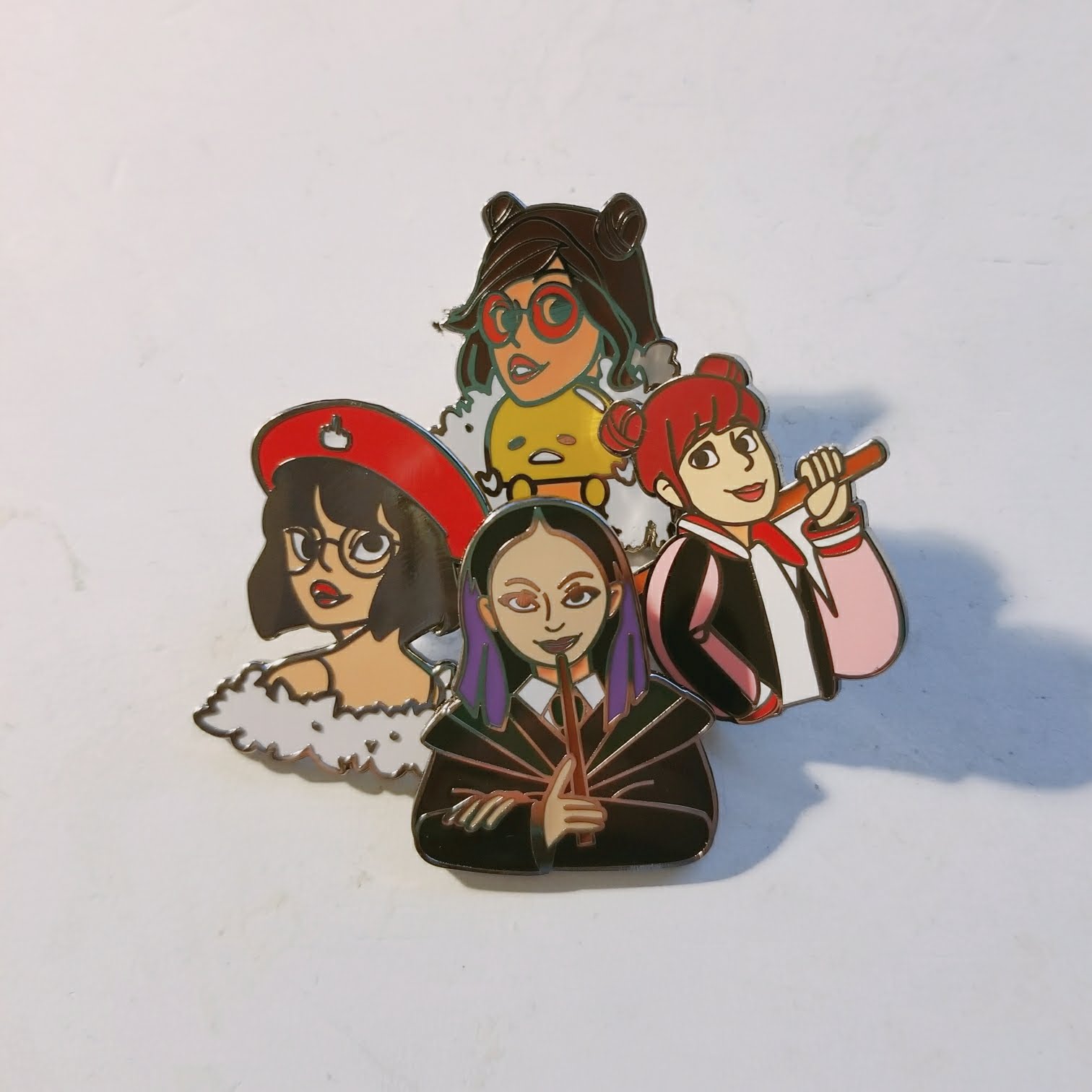  I recently worked to create some cloisonne or the hard enamel lapel pins that have been trending in the market lately. This batch is of a group of friends that dress up in cosplay. The art work and production management was all done by me.  Helping 