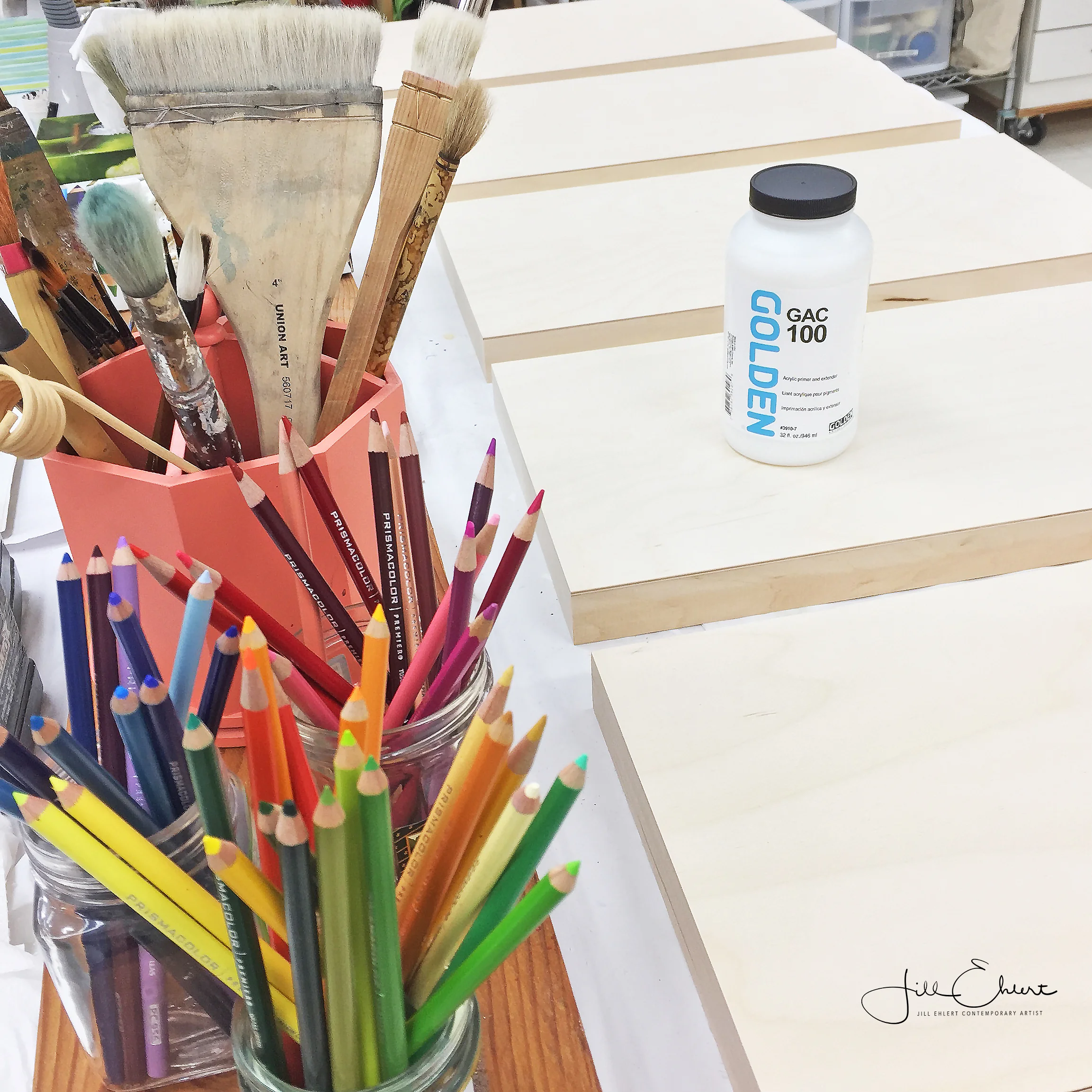 Priming cradle boards in preparation for new mixed-media collage work