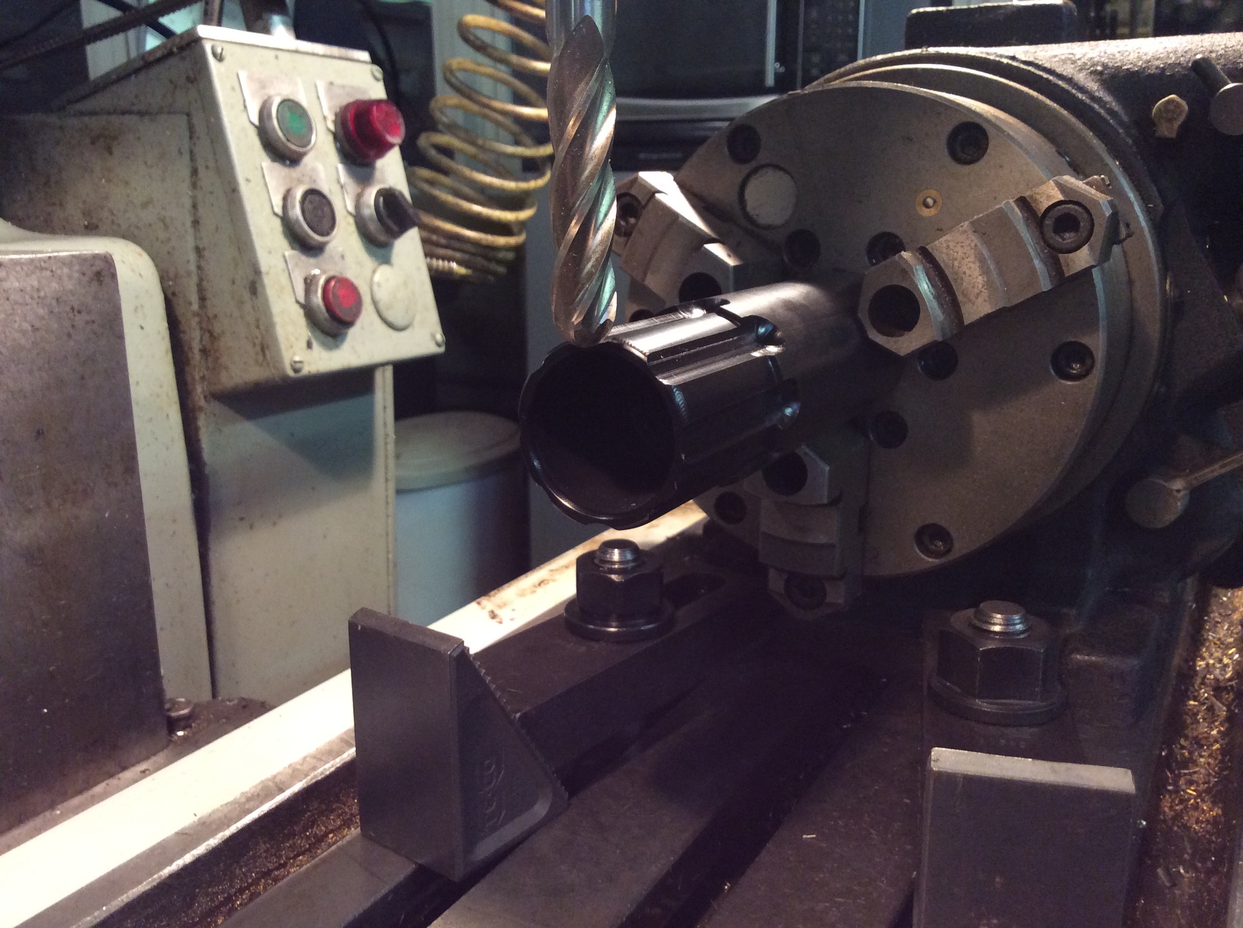 Using an indexing head to machine a grip detail.