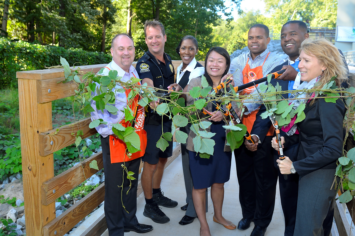 From left to right: Home Depot Lindbergh Store Manager David Sharpton, Lieutenant Jeff Baxter APD, Director of Sustainability Denise Quarles, newly appointed commissioner of City of Atlanta Parks and Recreation Amy Phuong, Home Depot Regional Manager Jabarr Bean, Atlanta Council President Ceasar Mitchell, Center Forward Planning's Heather Alhadeff. Photo courtesy of Eric Bowles' Photography