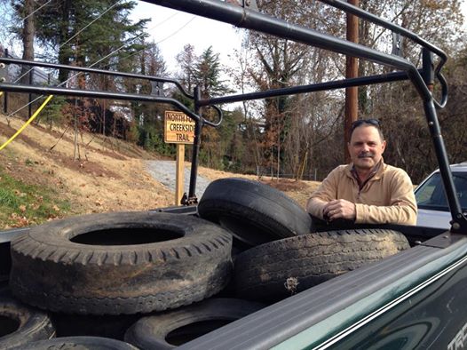Michael Montgomery's tireless energy tucked up twelve tires tossed illegally in the creek. Thanks Michael!