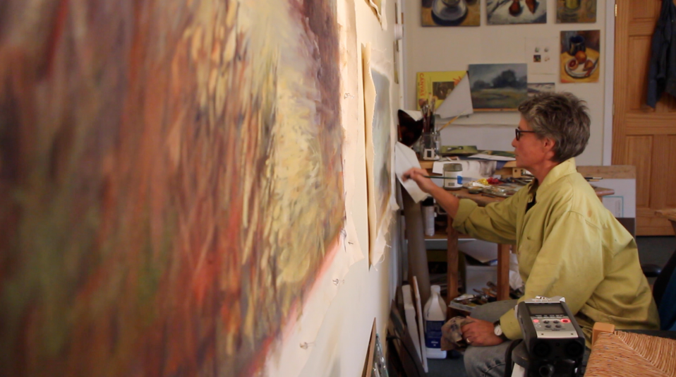 Production still of Trish Hurley painting on oil on canvas in her Newport, RI studio for the Patterns of Modesty documentary film.&nbsp;