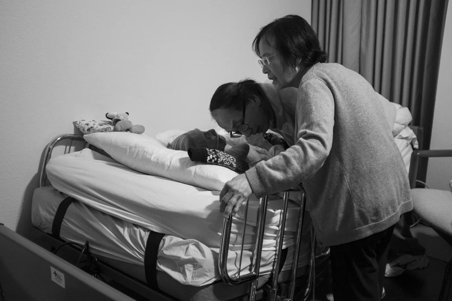 My uncle Peter and aunty Penny arrived on October 1, 2015 from Toronto, Canada. Peter bends down to listen to his mom whisper to him from her bed.