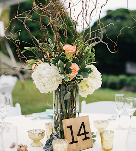  photo by Christie Pham  wedding location: Kualoa Ranch  candleholders and cylinders vases by Mood Event 