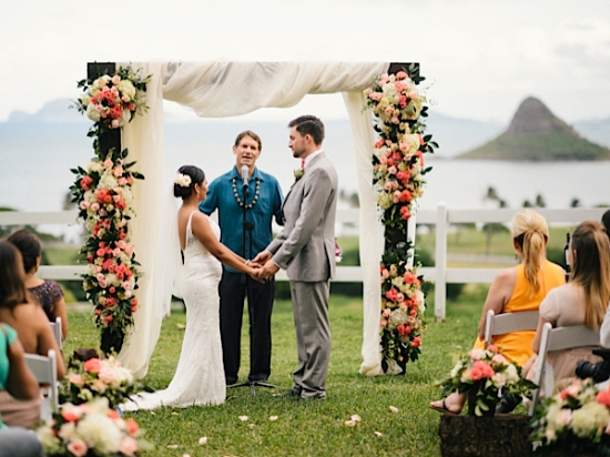  photo by Christie Pham  wedding location: Kualoa Ranch  ceremony arch by Mood Event 