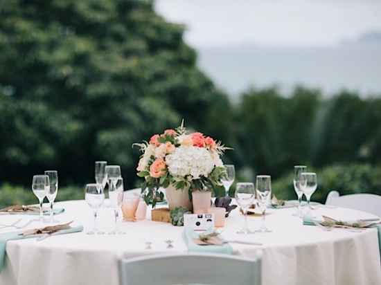  photo by Christie Pham  wedding location: Kualoa Ranch  candleholders and wood slab by Mood Event 
