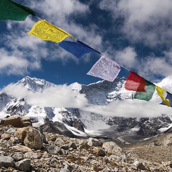 tibetan-prayer-flags-on-a-mountain-mario-colonel (1).jpeg