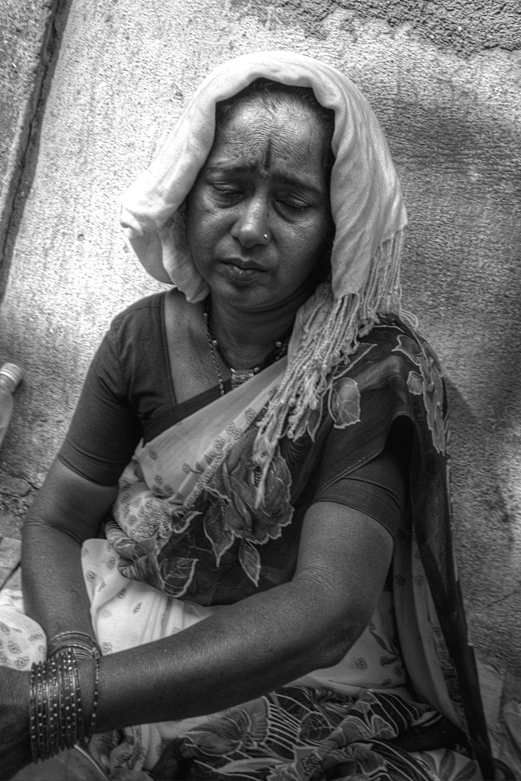 Sad woman in Mumbai, India