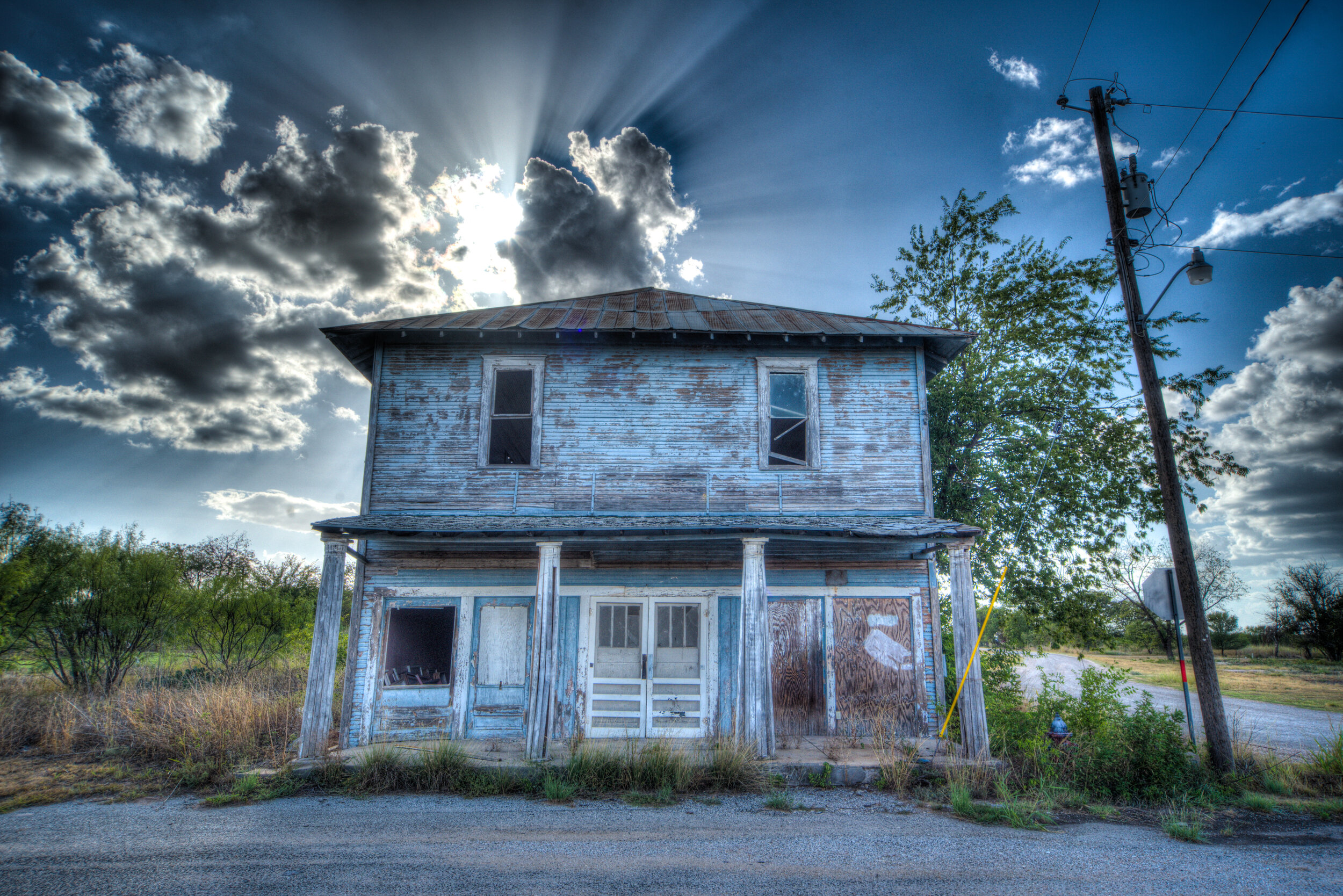 Abandoned Blue House. Melvin, Texas.