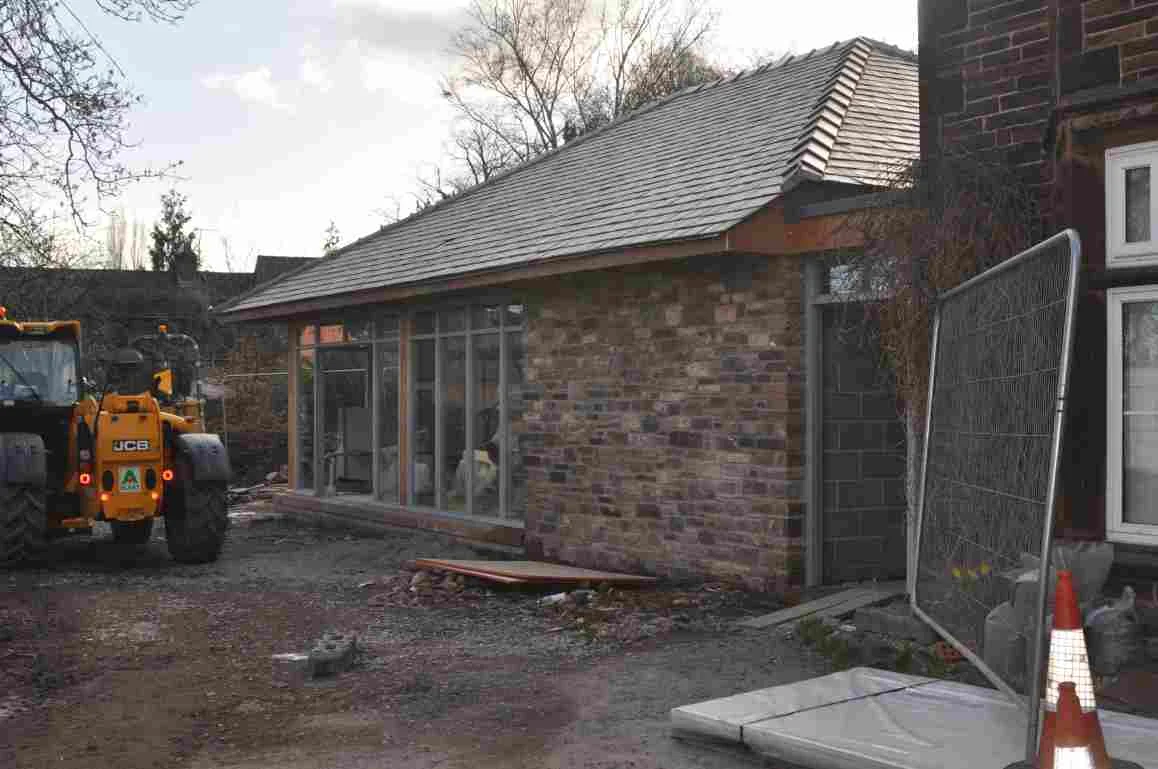 Walls and windows going in.