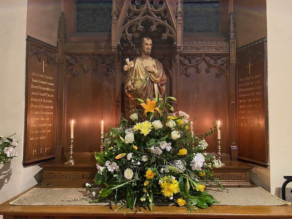 Easter 2022 StC flowers St Joe altar 2 .jpeg