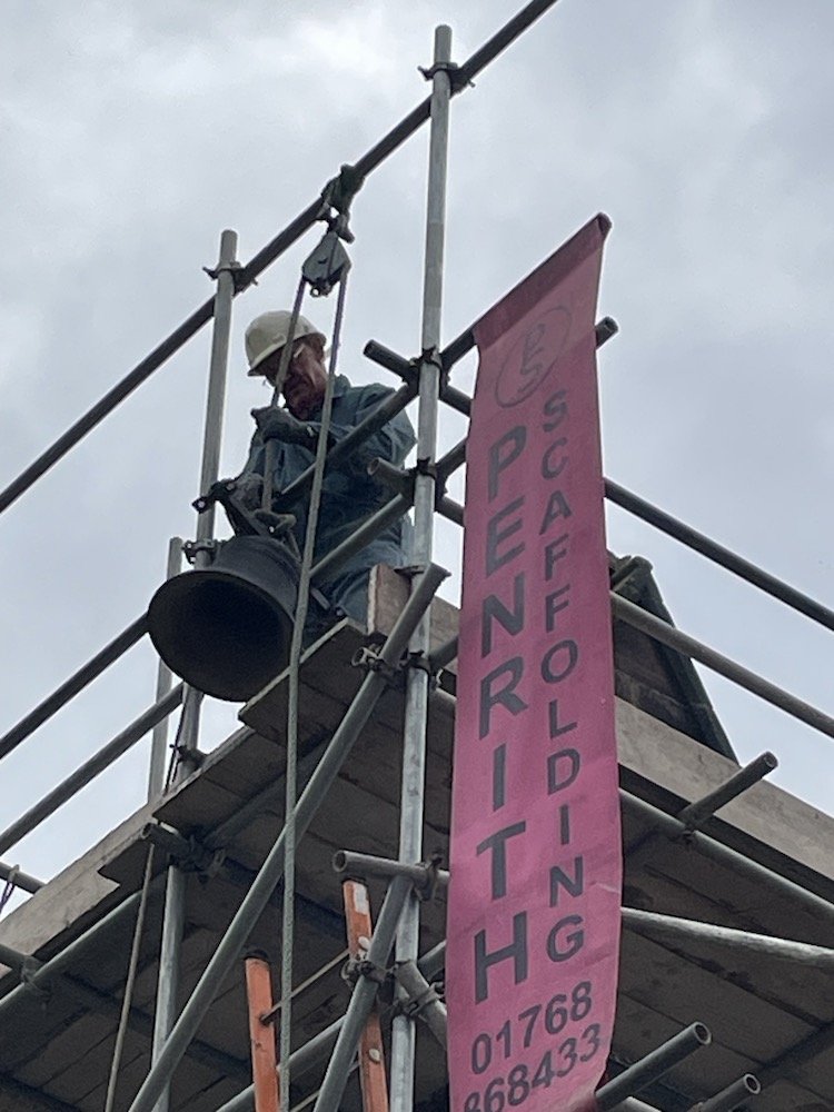BELL BEING HOISTED.jpeg