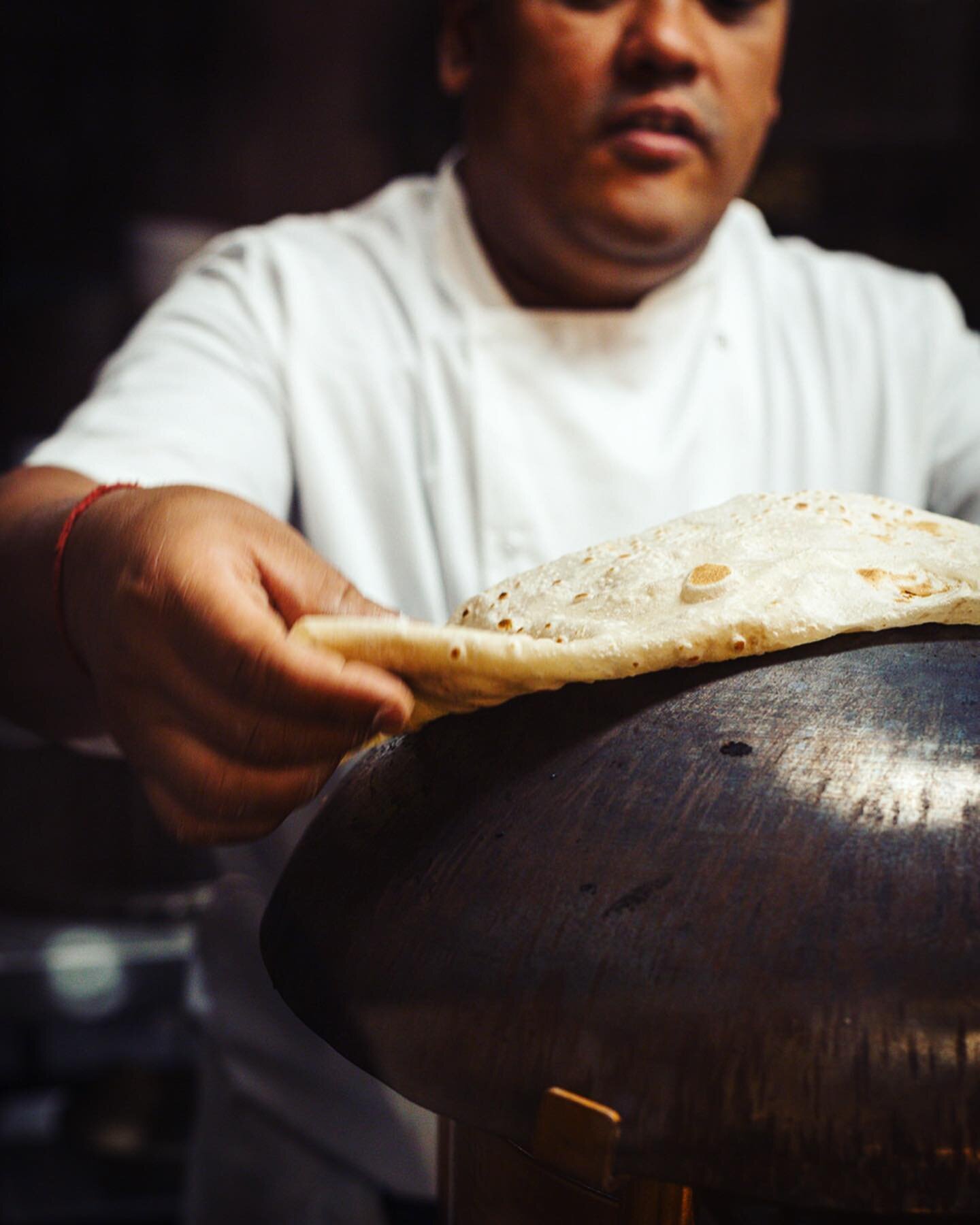 Cooking the Roomali Roti on an inverted Tawa @copperchimney_uk⁠⠀
⁠⠀
Menu and interiors for the amazing @copperchimney_uk opening last year.⁠⠀
⁠⠀
.⁠⠀
.⁠⠀
.⁠⠀
.⁠⠀
.⁠⠀
#londonfood #london #thisislondon #Foodies #londoneats #londonrestaurants #foodphotog