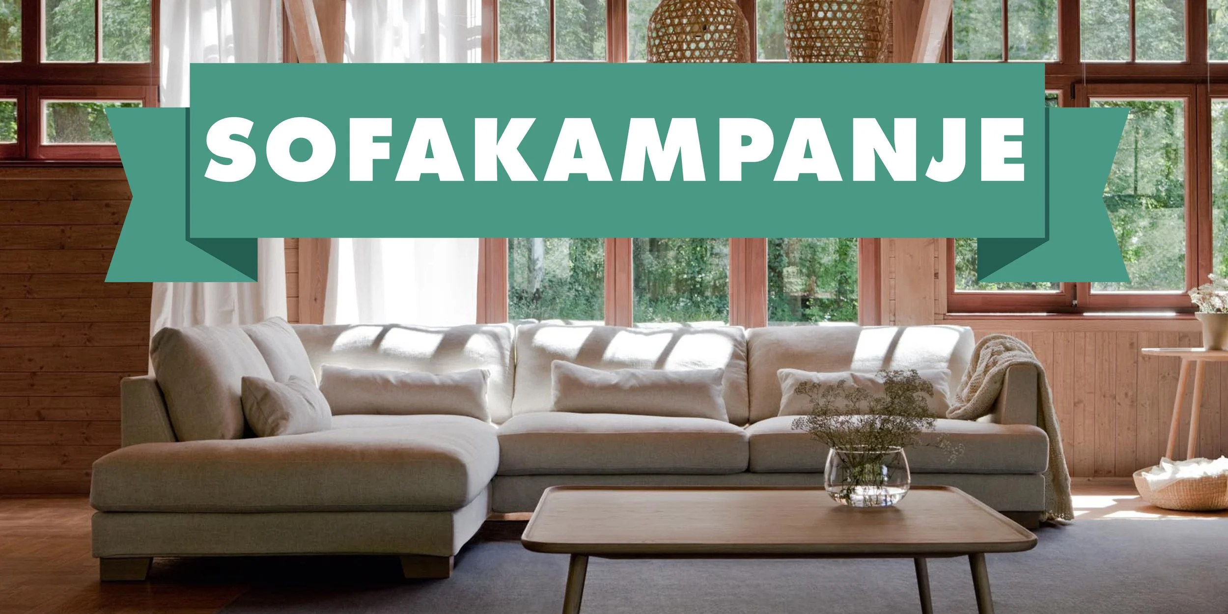 Promotional web banner featuring a white lounge sofa