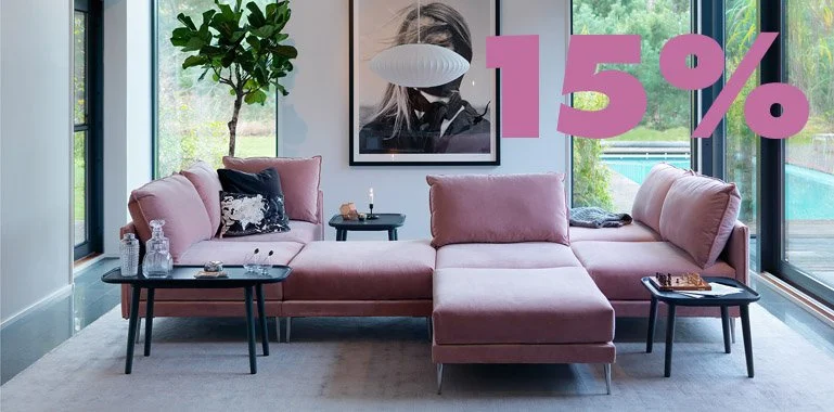 Image of a pink velvet modular sofa in a scandinavian interior