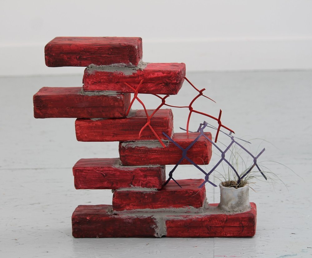   Nine Bricks, 2014   Paint, foam, paper, clay and plant, approximately 12 inches x 12 inches 