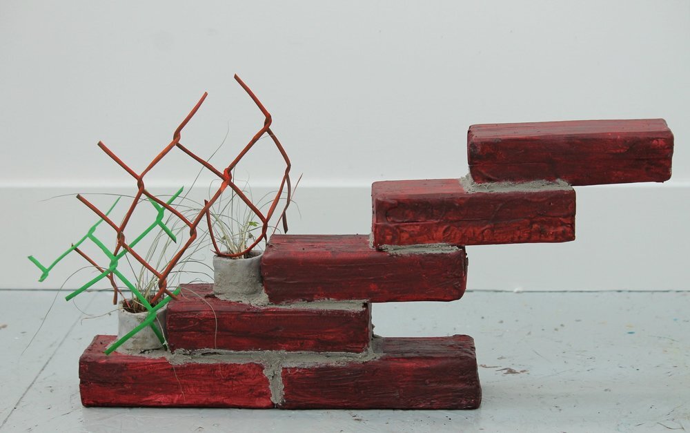   Six Bricks, 2014   Paint, foam, paper, clay and plant, approximately 10 inches x 12 inches 