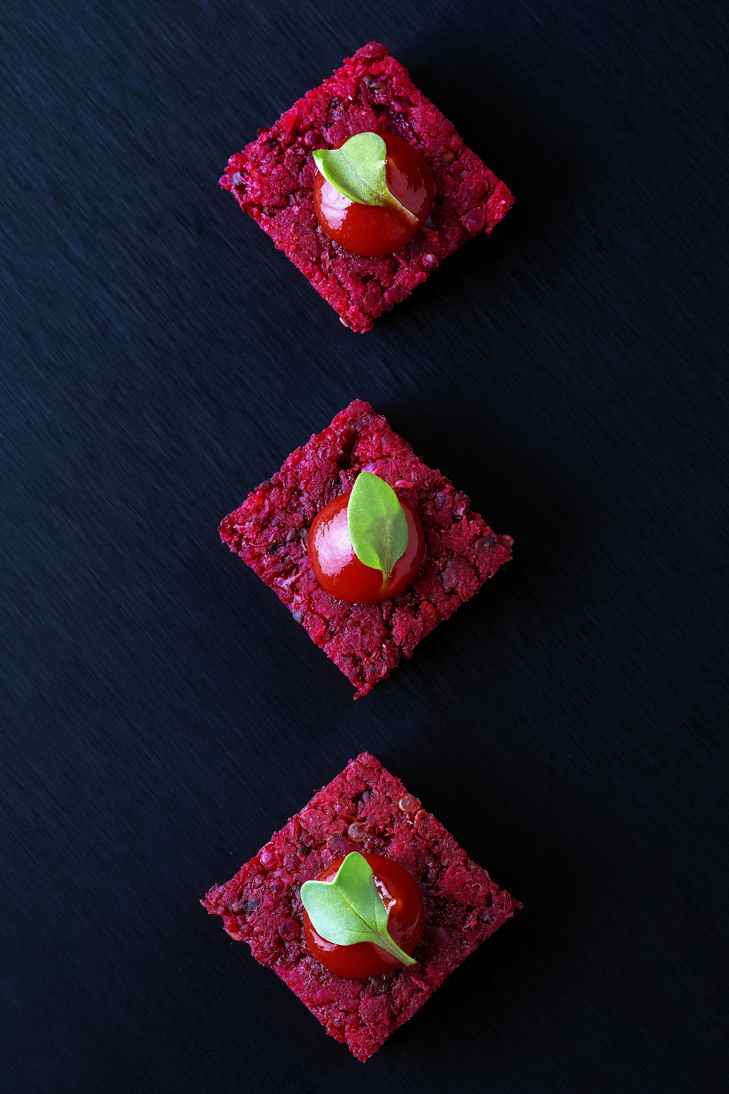 Beetloaf with cherry tomato and micro basil