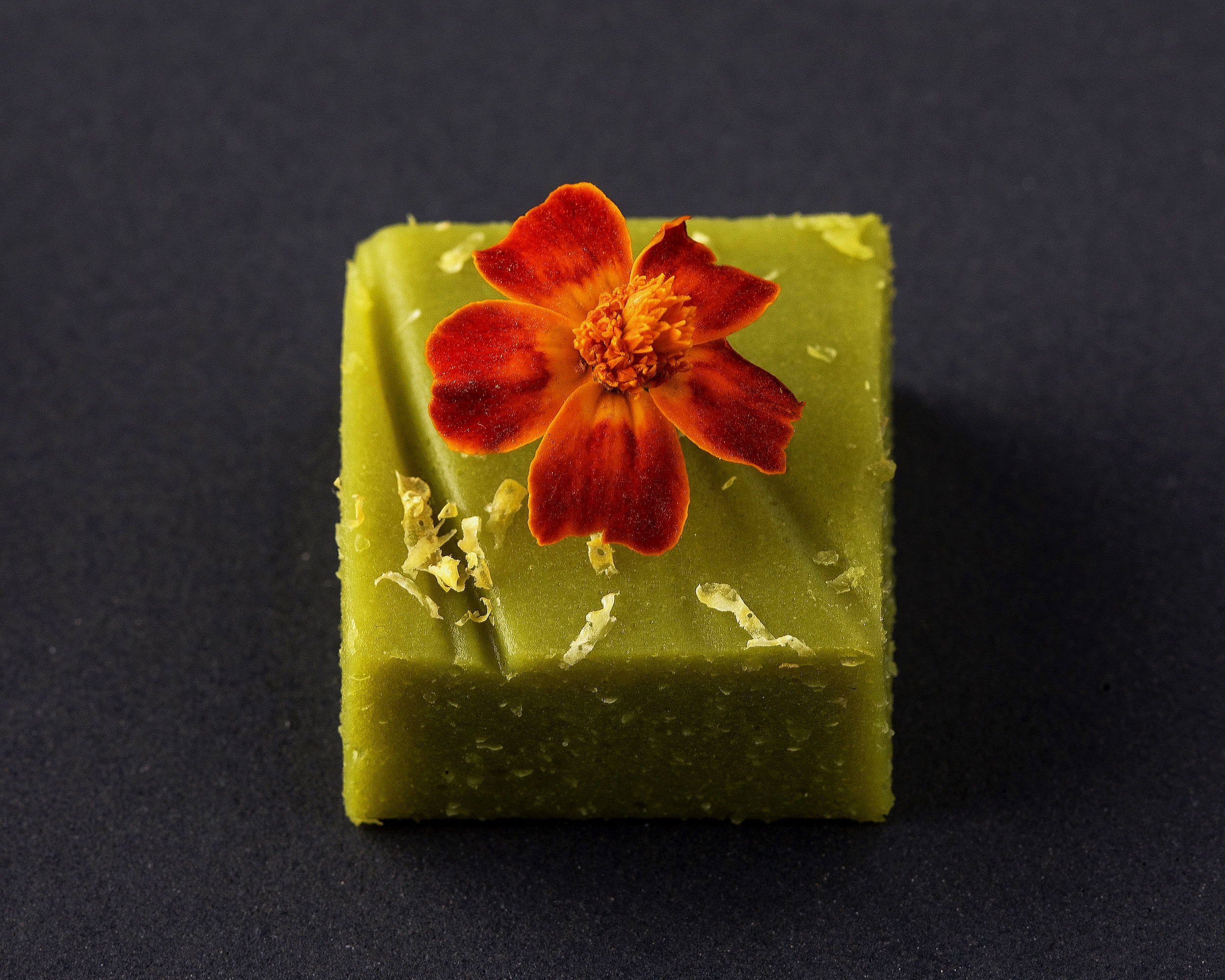 Sweet pea pate de fruit with edible flower