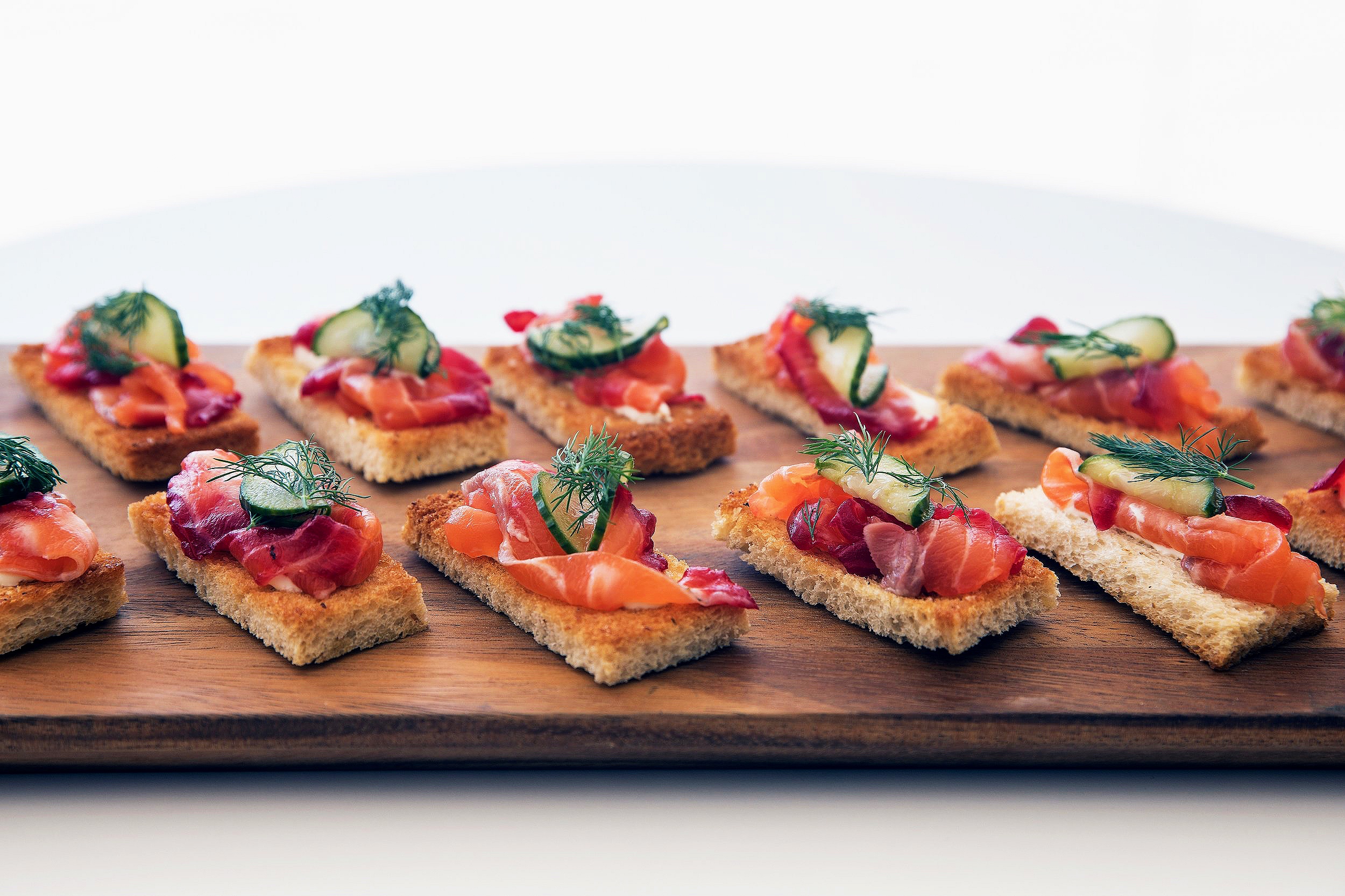 Salmon toast with cucumber and dill