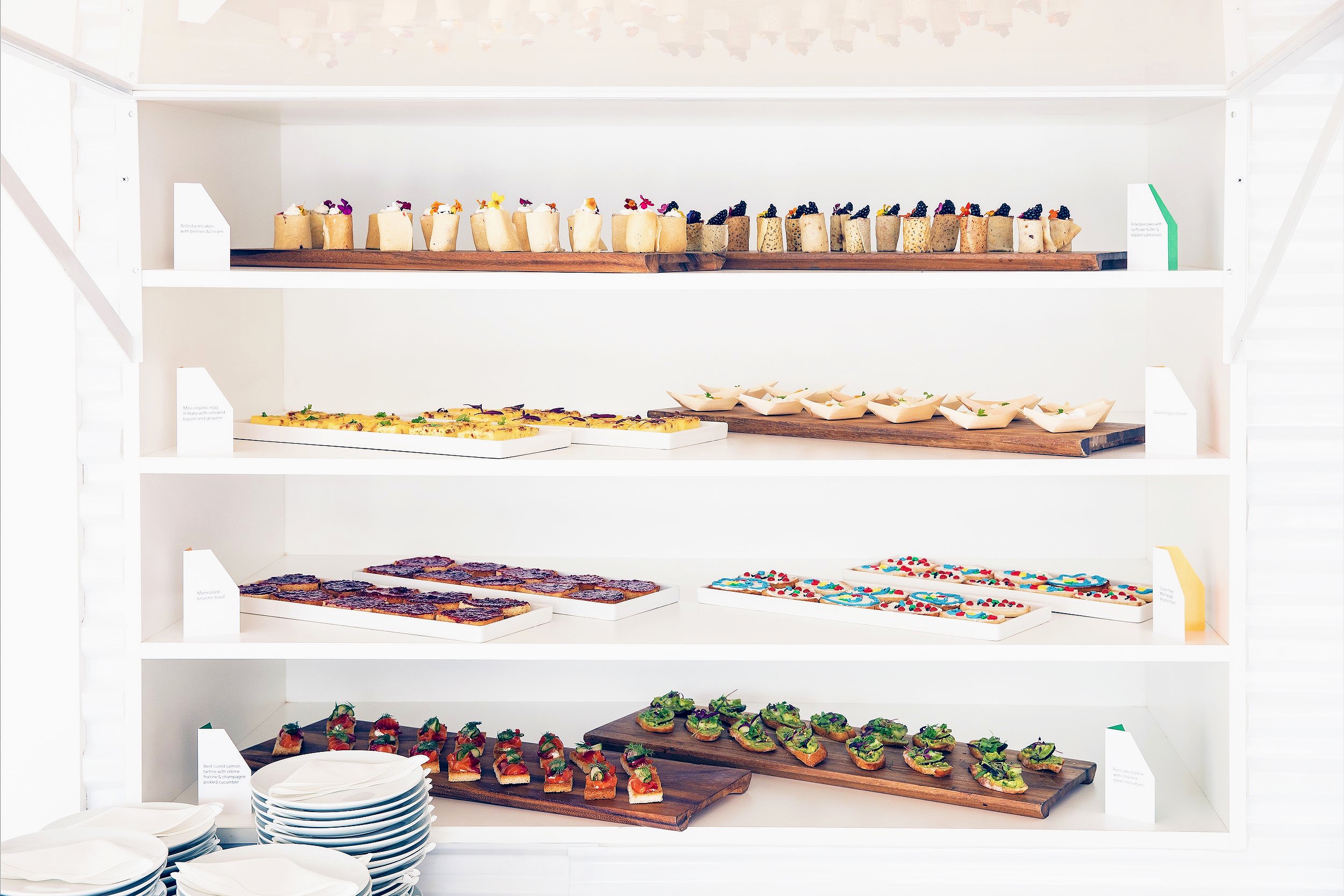 Breakfast spread with sweet crepes, quiche, frittata, cloud eggs, and sweet and savory toast options