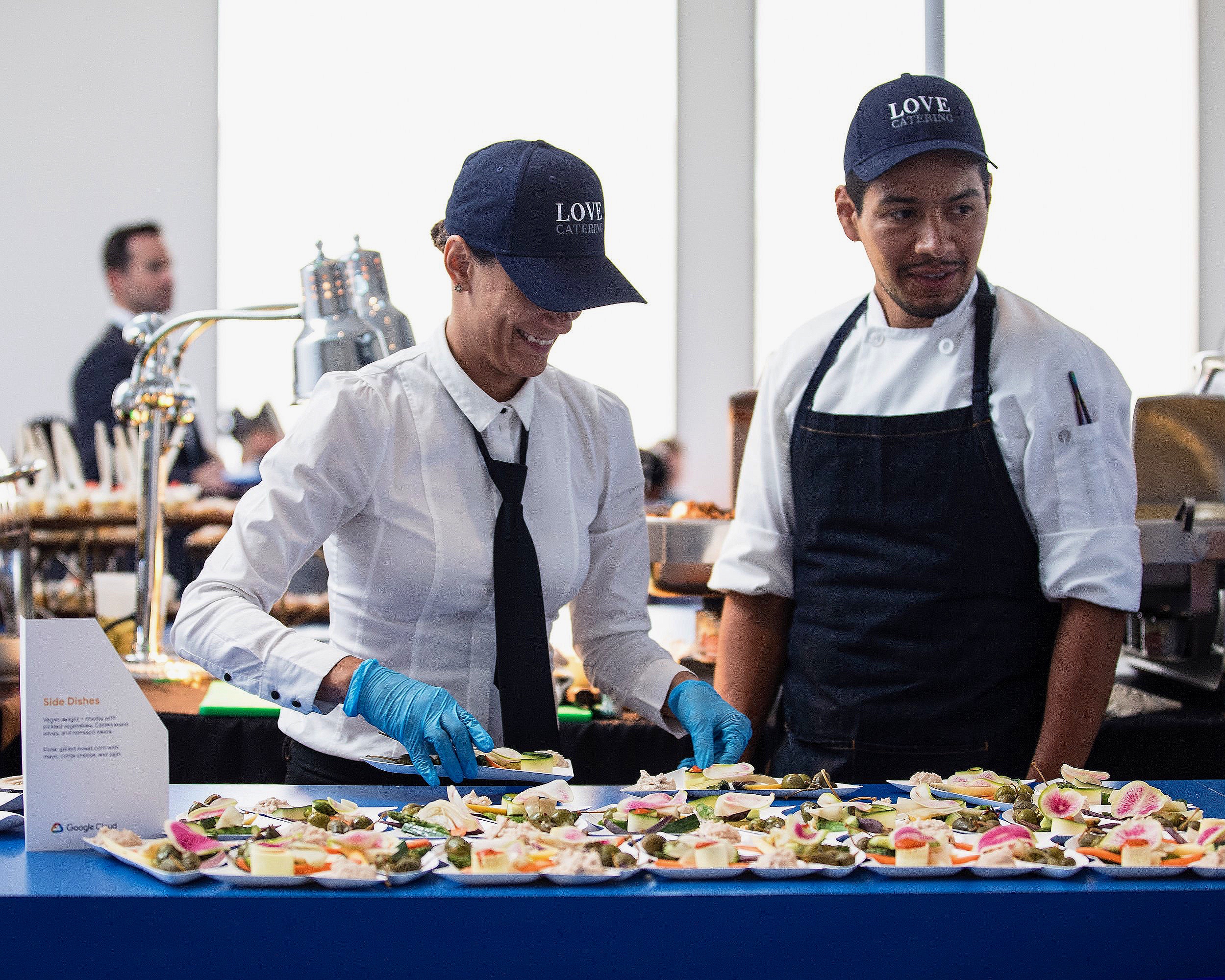 Staff preparing side dishes