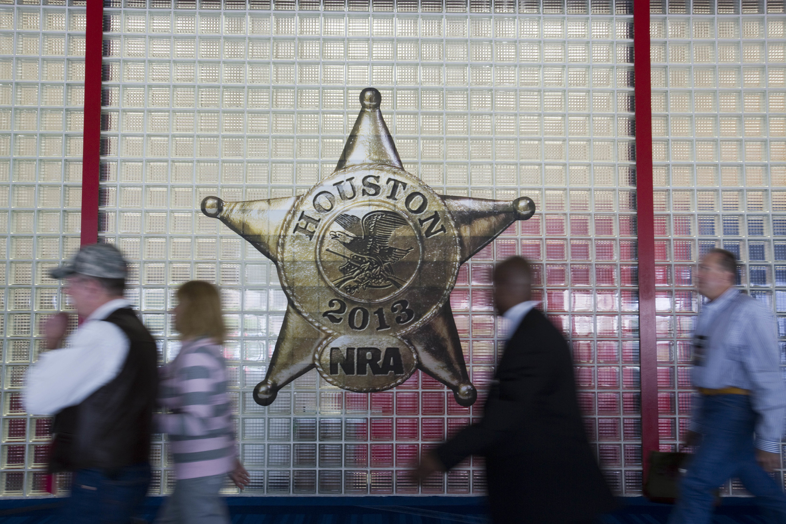  Visitors stroll through the 2013 National Rifle Association Meeting and Exhibits May 3, 2013 in Houston. 