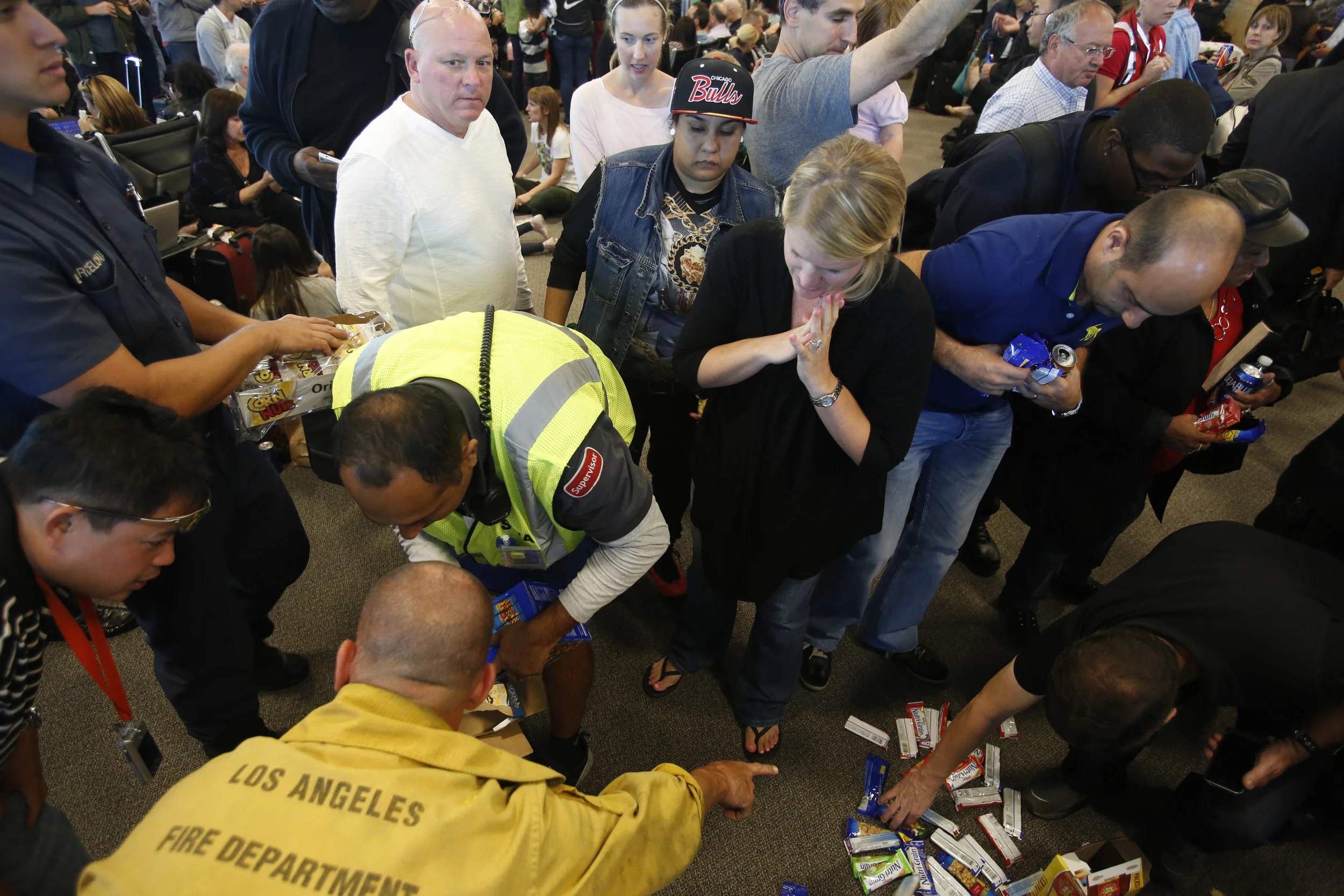 Los Angeles firemen dumped boxes of food on the carpet...