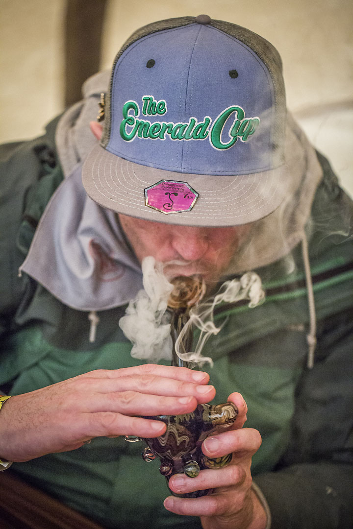  Zelly Rock takes a hit of weed inside a teepee &nbsp;at the Emerald Cup. 