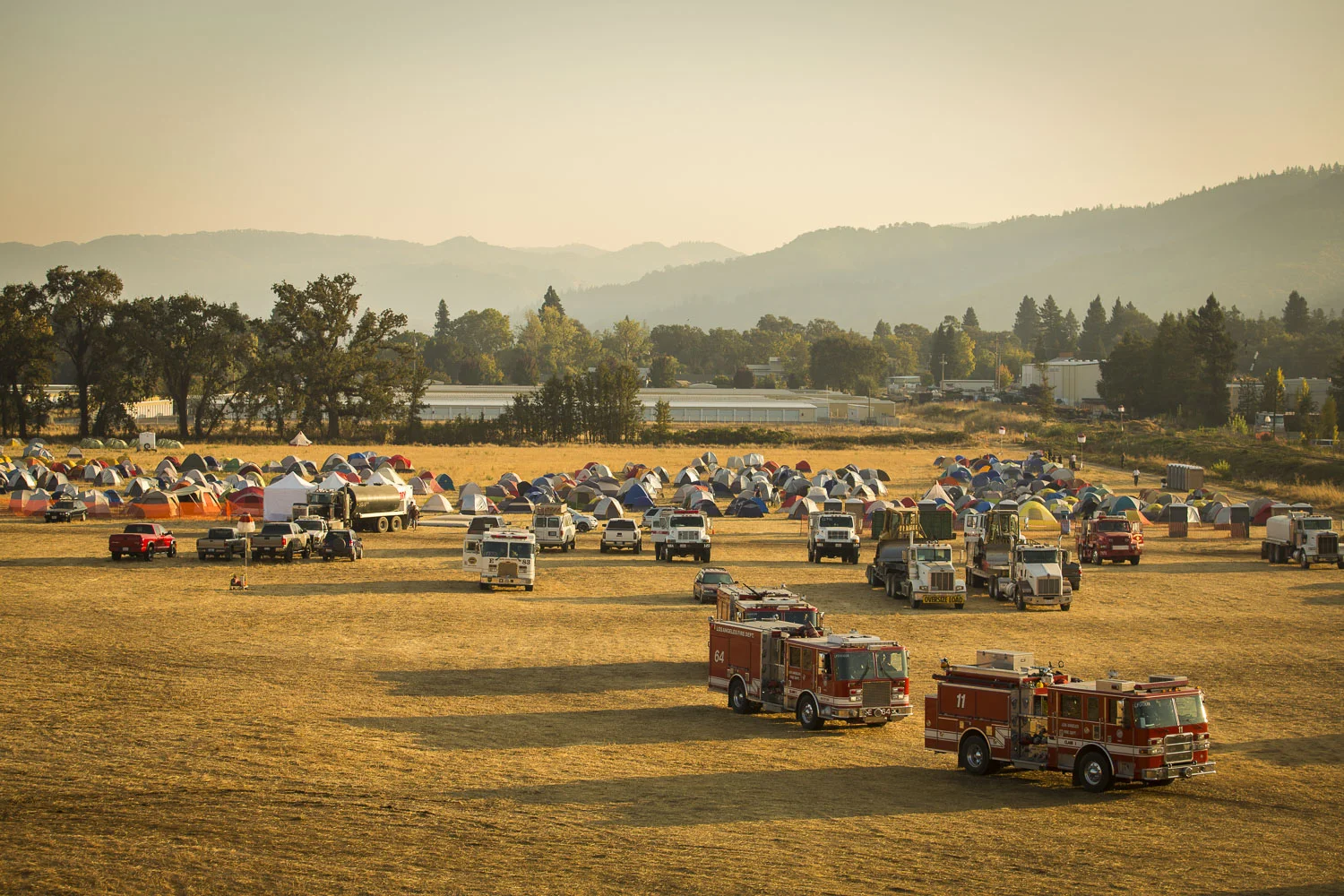 Firemen leave the Redwood Empire Fairgrounds Oct. 15, 2017 in Ukiah, CA. The fairgrounds were used as a staging area for fire officials.
