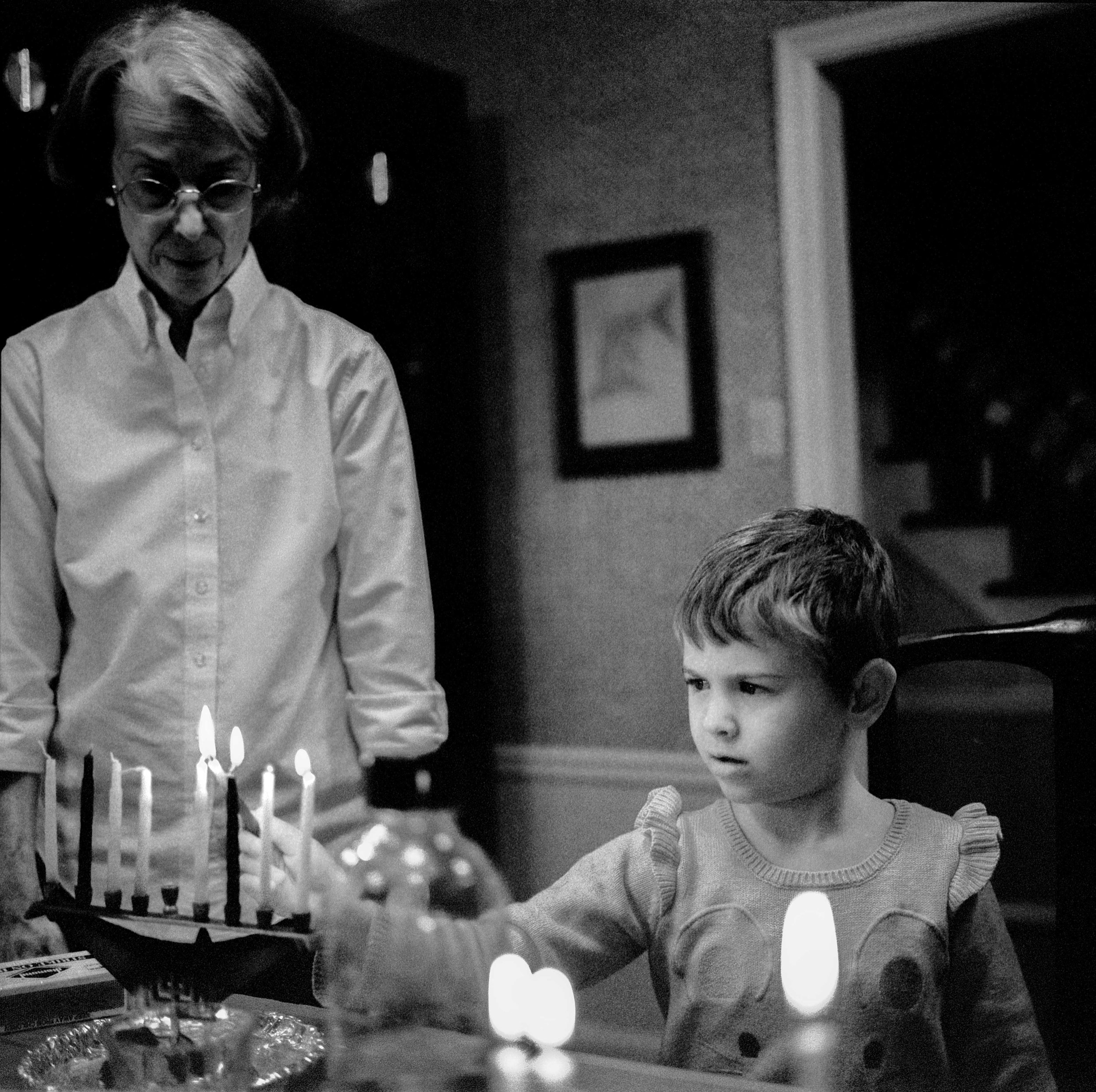  My daughter lights Hanukkah candles, Dec. 2017 in St. Louis, Missouri. 