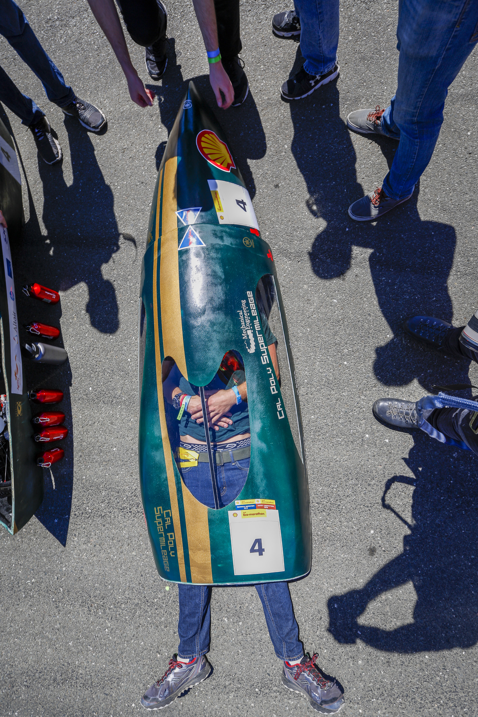  Team Cal Poly Supermileage with their vehicle the Donald Duck,&nbsp; #4, from California Polytechnic State University, San Luis Obispo, CA, United States, competing under the Prototype - Gasoline category waits before a group portrait during day two