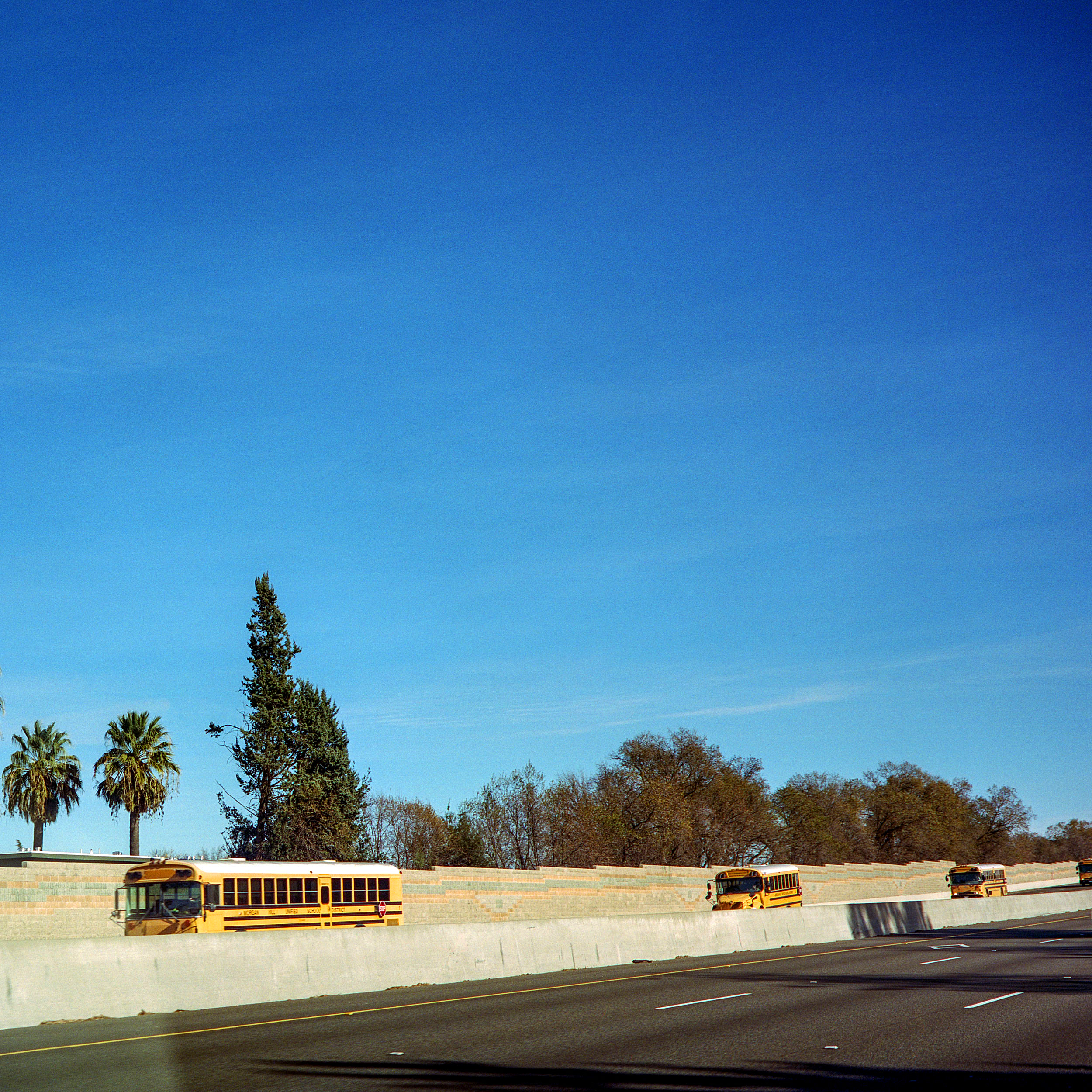  Buses traveling back from the sierras to a school district near San Jose. 