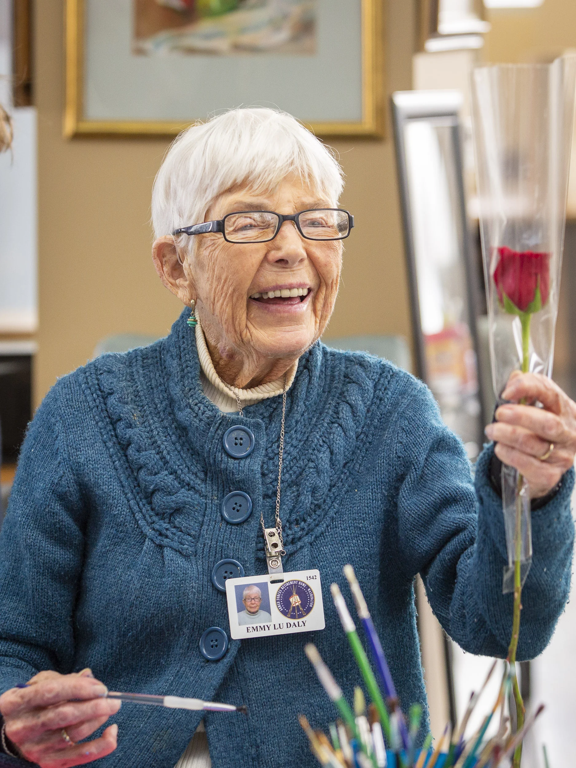 A military veteran receives a rose from 1-800-Flowers.com at the Armed Forces Retirement Home on Valentine’s Day on Thursday, Feb. 14, 2019 in Washington, DC.
