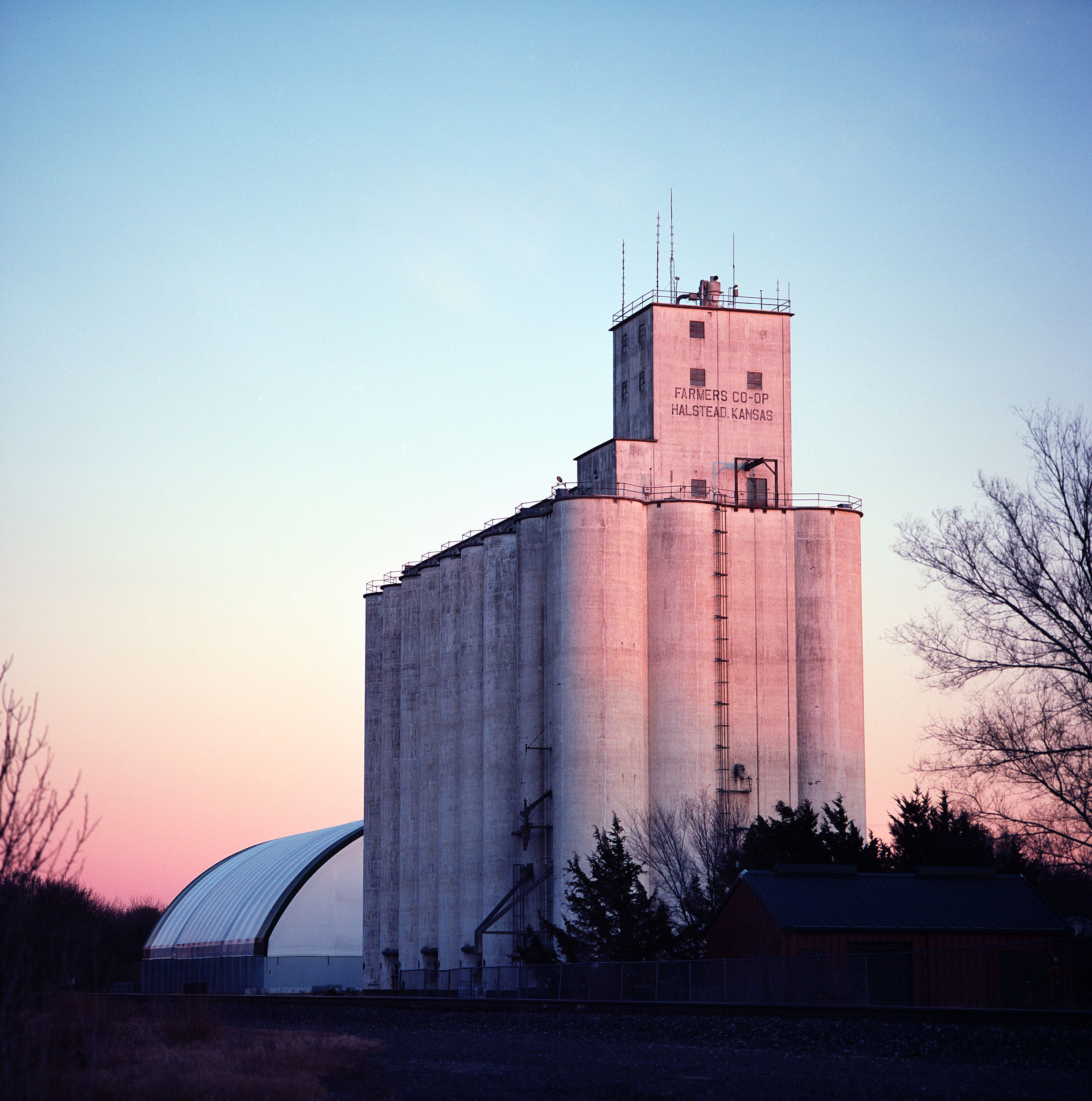 Grain mill, Halstead, Kansas, photographed after eating a Subway sandwich. I realize grain mills at dusk are visual low hanging fruit, but I couldn’t resist!