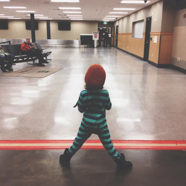 waiting for her 10pm arrival at the airport gate.